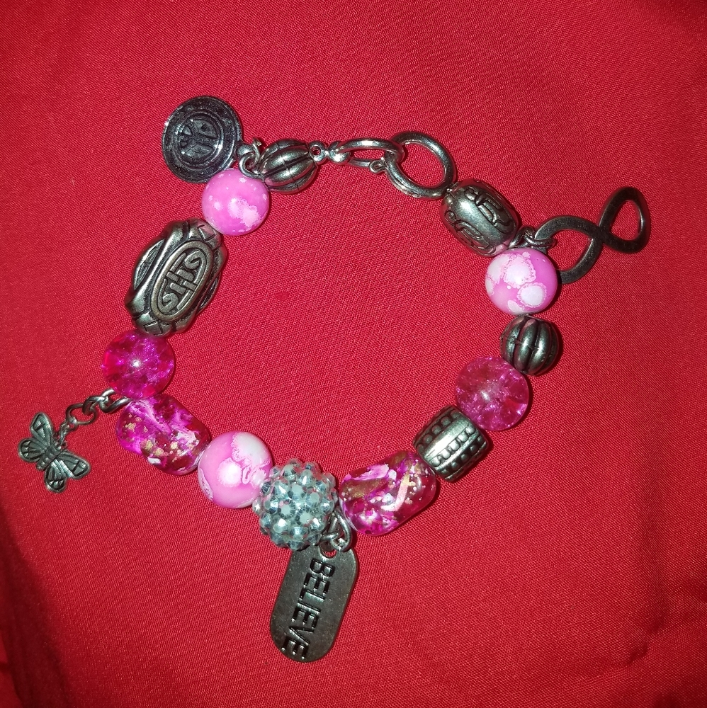 A pink charm bracelet